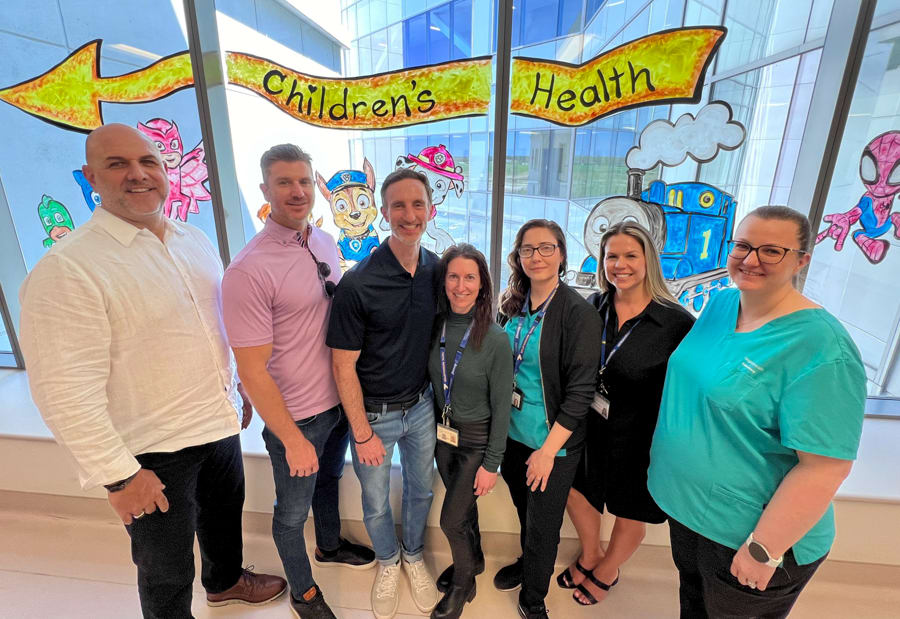 Members of the Niagara Health laboratory team who support the new Ronald McDonald House Family Room being built at the Marotta Family Hospital.