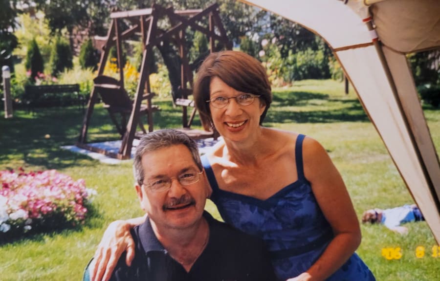 Bob Lighthouse and Judy Chamberlain outdoors on a sunny summer day.