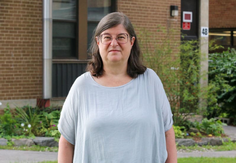 Dr. Anina Abrie stands outside the Welland hospital on summer day