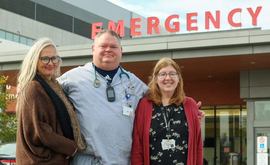 Nurse practitioners Liz Sharma, Cameron Jones and Laurie Angle stand outside the emergency department at the St. Catharines hospital
