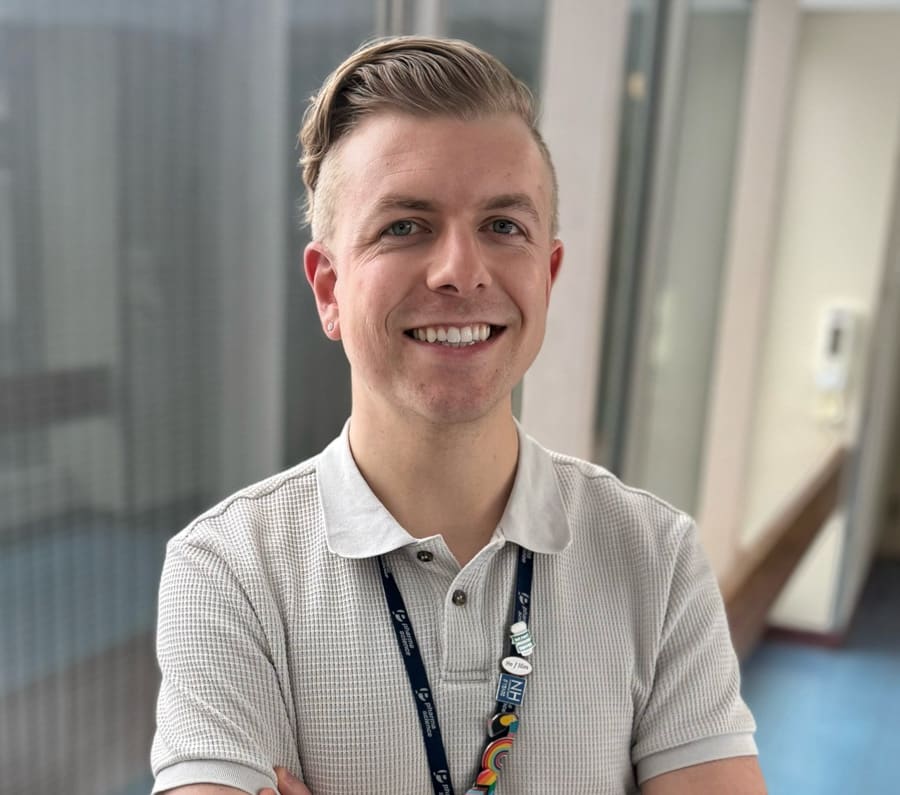 Jacob Cashin, clinical pharmacist, in a hospital hallway