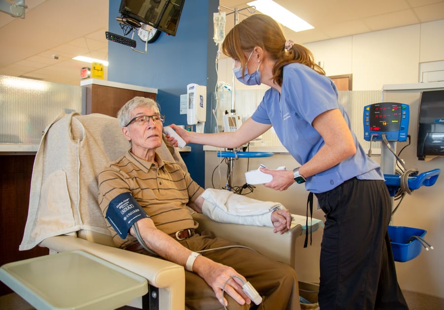 Radiation physicist Joe Szabo with Registered Nurse Allison Adams