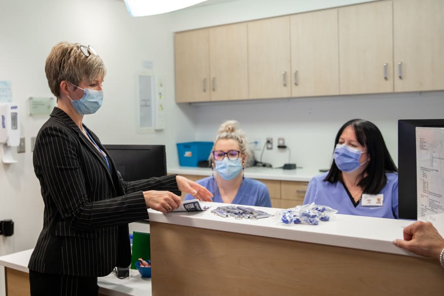 Niagara Health President and CEO talks with hospital staff. 