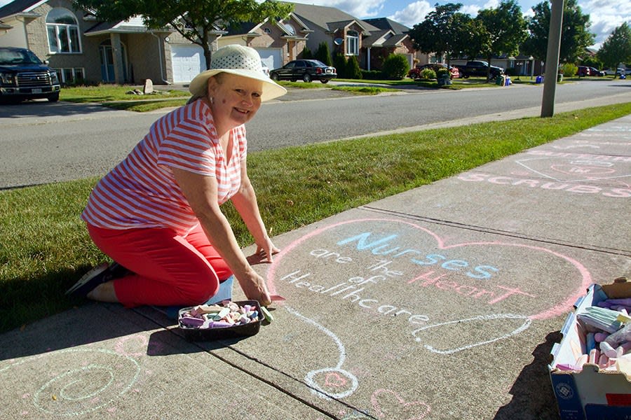 Welland resident Norma Lizotte became a sidewalk chalk artist to help pass the time during the pandemic. Among her many drawings, she often writes messages of support for healthcare workers.