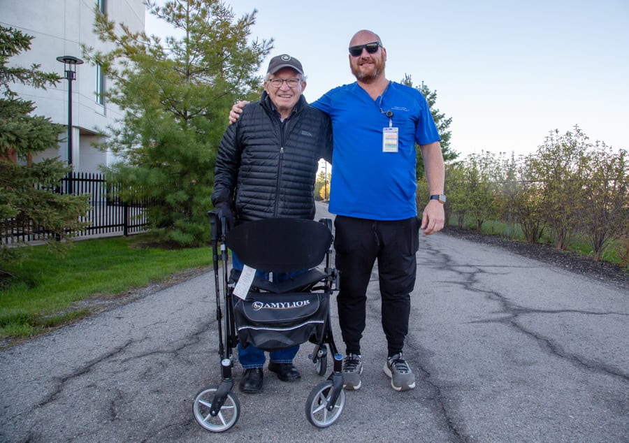 John Gerden and Mark Ritchie on the path circling the Marotta Family Hospital in St. Catharines.