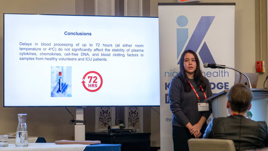 Vanessa Gyorffy, a former summer student with the Niagara Health Knowledge Institute, presents the findings of her research project, at the CCIRNet Symposium on Nov. 28, 2023 in Toronto.