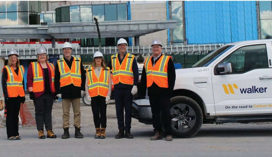Members of Walker Industries and the South Niagara Hospital fundraising committee stand outside the hospital construction site