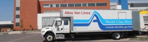 moving van in front of the new hospital building